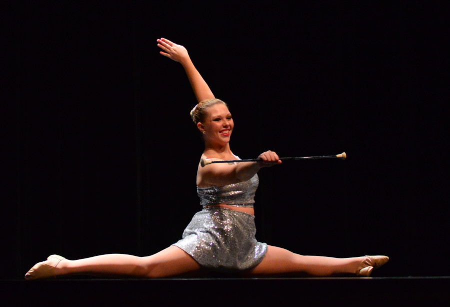 Senior Kautia Matyko exhibits her baton twirling skills at the talent show.  Matyko came in second place.