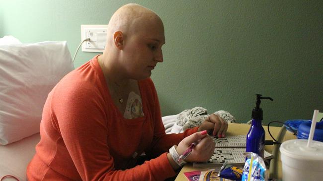 On Jan. 11, Baltz plays a game of Sudoku during her last round of chemotherapy at Arnold Palmer Hospital. 