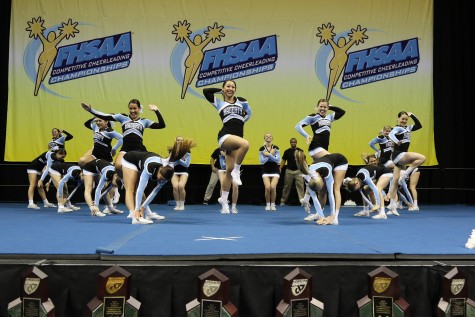 Cheer performs a powerful dance after they hit at the State competition. 