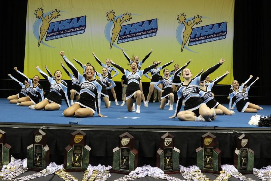 Cheer strikes a pose after performing in the state finals competition on Jan. 30 at USF’s Sun Dome. The team, which was scored based off of execution and  routine difficulty, scored a record 92.45 points, the highest score ever awarded in the state competition. 