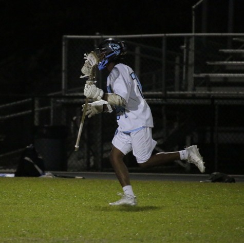 Attack Granite Porcher moves the ball downfield against Trinity Prep.