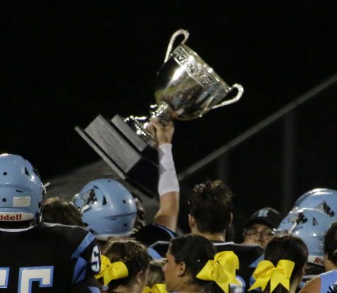 The team holds up the Mayor’s Cup after the Oviedo win. This was the first time the team defeated Oviedo since 2010. 