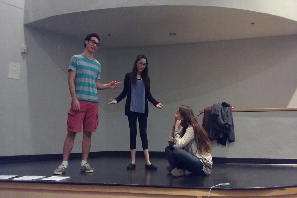 Junior Ellie Bailey and sophomores Emily Canamella and Vangeli Tsompanidis practice for the upcoming musical. The Mystery of Edwin Drood will be held on November 3, 4 and 5.