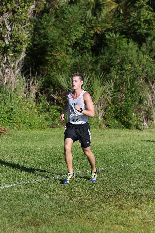 Senior Tyler Klein runs during a race. The boys finished the season at regionals.