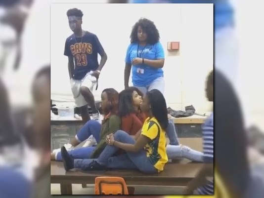 A screenshot of the Mannequin Challenge,  done by the Edward White High School students who were the  first ones to do it.