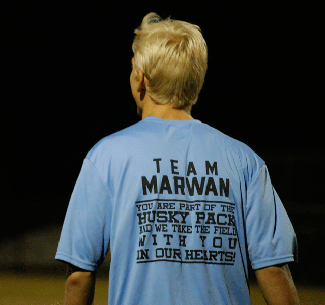 Junior Michael Lynch wears his Team Marwan shirt during a scrimmage. The players wear the shirts during their warm-ups.