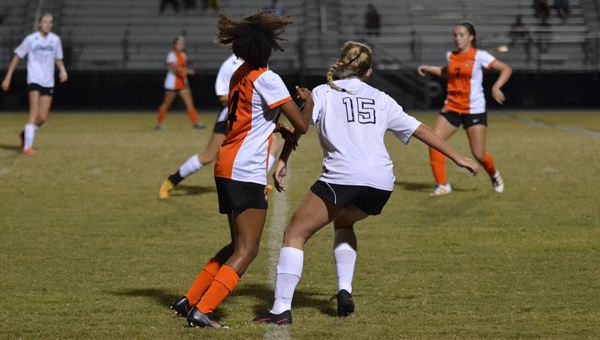 Sophomore Morgan Caudill breaks away from her defender. It is her second year playing soccer for Hagerty.