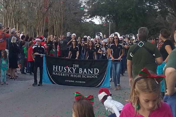 Drum majors, front ensemble and percussion led the band in the parade. The parade was on Oviedo Blvd. which led into Oviedo on the Park. 