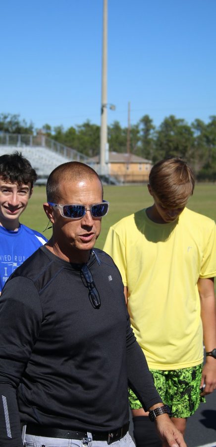 Cross country and track head cosch Jay Getty talks to the boys track team in practice on  Wednesday, Feb. 1. 