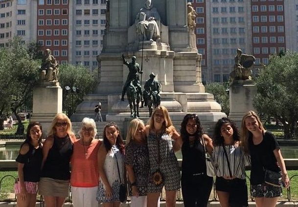 French level II, III and IV  students and French teacher Pamela Lynch pose next to Cervantes Monument at Plaza de Espana in Madrid. The group last stop was Madrid, Spain after they visited 4 regions in France and Barcelona in Spain. 