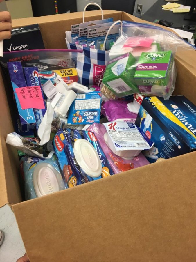 Spanish teacher Nitza Ariza’s class donations wait to get sent out to Disaster Relief Drive for Puerto Rico. Chess Club and Key Club collected supplies and sent them to Ariza’s room. 