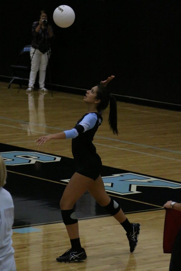 Hitter Leandra Mangual serves the ball in the regional final match against Plant. The team won 3-1.