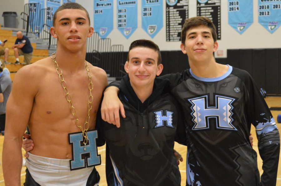 Senior Brandon Boyle (center) was also supposed to compete on senior night, Feb. 7, against Oviedo opponent Chris Micelli. However, Boyle tore his right ACL during winter break while practicing wrestling moves with a teammate. Although he was unable to compete, he still wanted to show up and watch his fellow seniors compete. 

“I didnt compete in the competition, but I am still glad to see our other seniors win their matches,” Boyle said.  