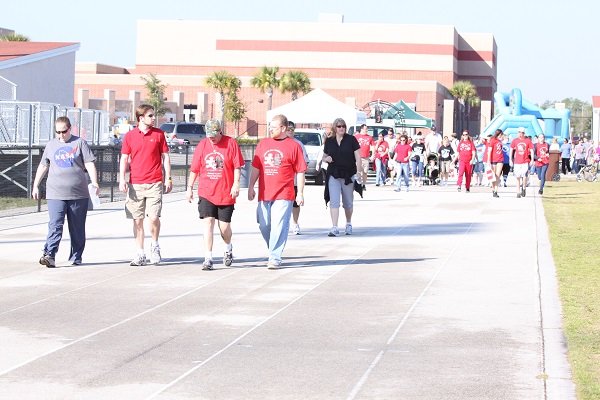 Participants walk around the track at the Sam Momary Stadium. Last year, this event was able to raise over $4,000. 