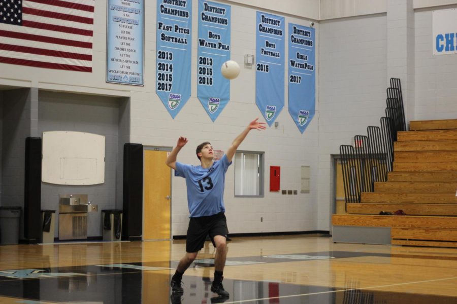 Middle Daniel Heinis serves the ball in the game over Lake Mary. The team won 3-2.