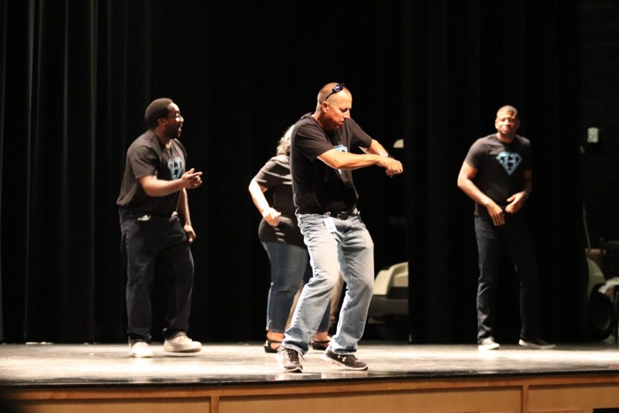 Athletic Director Jay Getty dances at the senior skit. Relating to students is only one of his many attributes that contributed to this award.
