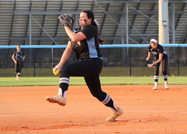 Senior Ashley Worrell pitches against Winter Springs in the district championship on Thursday, April 26. The team lost 8-6, but has a chance to play Winter Springs again in the second round of the regional playoffs.