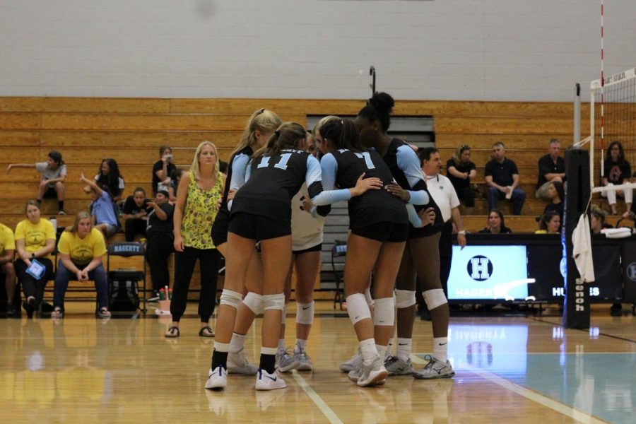 The team rallies after a point was scored. Hagerty lost 3-0.