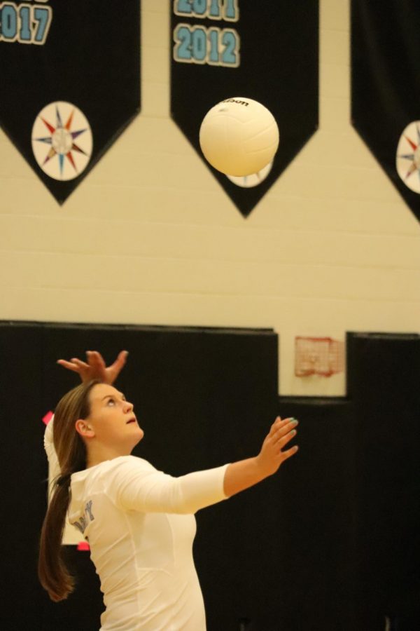 Senior hitter Morgan Roman delivering a serve in the third set. With 9 kills, she helped her team to a 3-0 victory.
