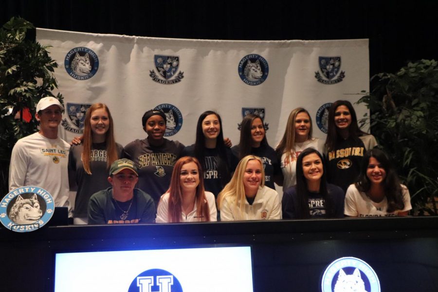 2019 NCAA commits take a picture in the auditorium. Senior Leandra Mangual will be graduating early in January.
