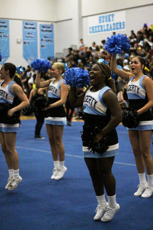 Senior+XZaria+Bullard+cheers+during+a+pep+rally.+Pep+rallies+are+often+used+to+help+the+team+with+their+Game+Day+routines.