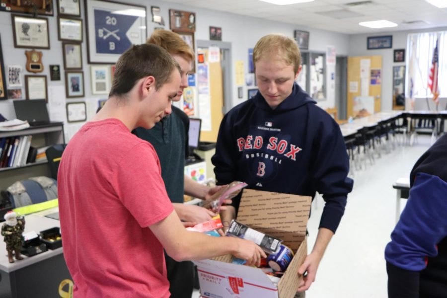 JROTC cadets package supplies for soldiers as a part of this years Operation Care Project. Items were collected to send for Christmas. 