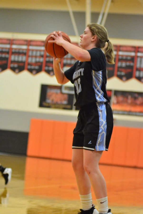 Shooting guard Megan Reilly scores eight threes in their first ever playoff win.