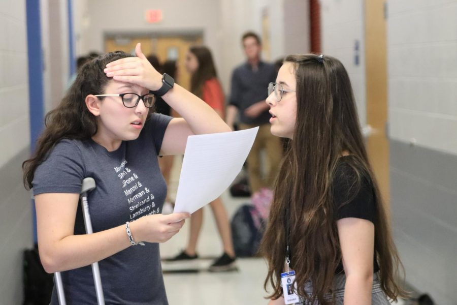 Sophomore Olivia Martin and freshman Lily Joseph practice lines for Joseph’s upcoming audition. She ended up landing the part of Mary Warren.