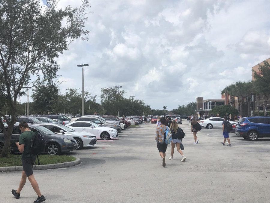 Students in the red lot leave school for the day. This lot was for those with six or seven classes on campus.