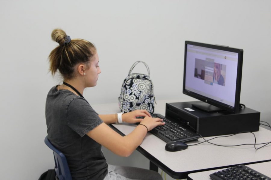 Freshman Lola Navarro works on her online Spanish course. Recent changes in the FLVS virtual system have caused uncertainty for the long-term future of the program.