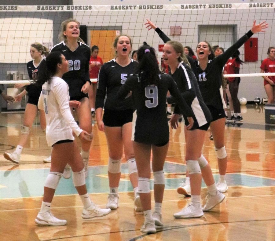 Girls+varsity+volleyball+celebrates+a+five-set+win+against+Leon+on+senior+night+on+Friday%2C+Oct.+11.++Leon%2C+the+team+that+beat+Hagerty+in+the+state+semifinals+two+years+ago%2C+was+ranked+number+one+in+the+state+before+losing+to+Hagerty.
