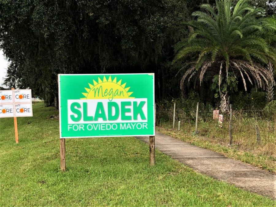 Signs such as candidate Megan Sladeks were found across Oviedo as a part of the race for mayor. Sladek won the election with 44% of the vote 