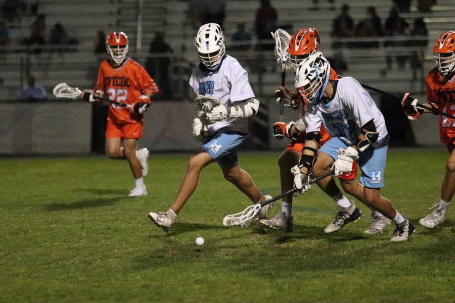 Midfielder, Collin Bruno goes in for the ground ball in the first half. Bruno won possession and advanced the offensive play.