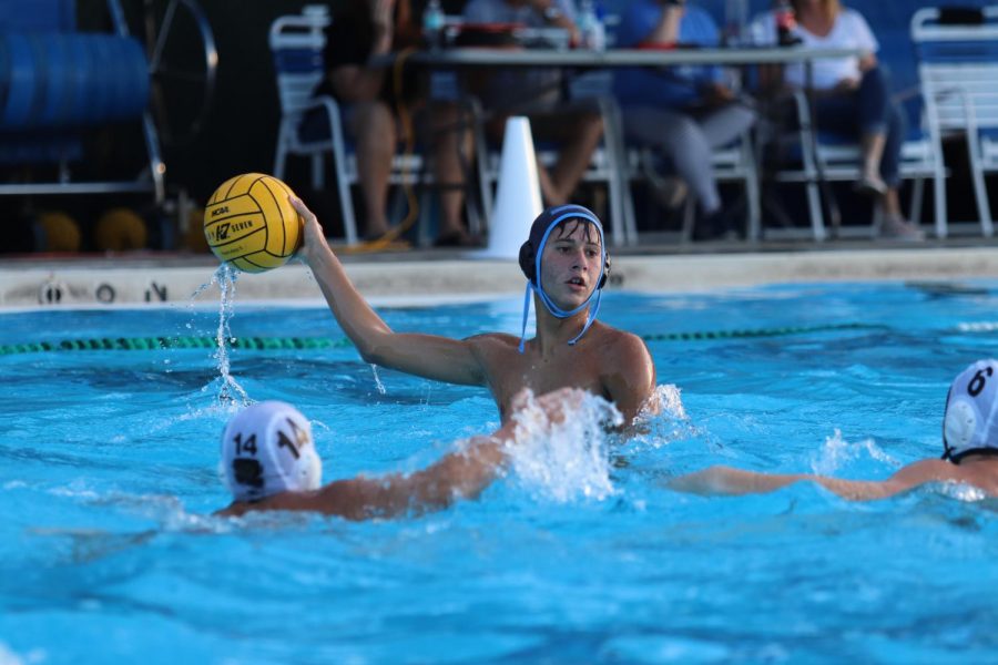 Michael Grinstead plays in a water polo game last season. He scored seven goals against Oviedo on March 6, but it wasnt enough in a 13-18 loss.