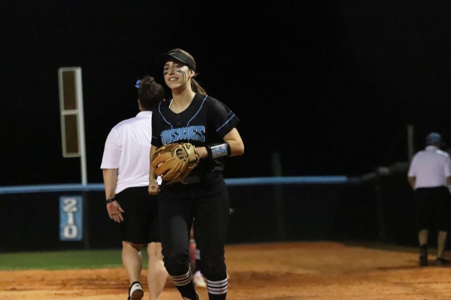 Third baseman Elisa Grande gets into place.