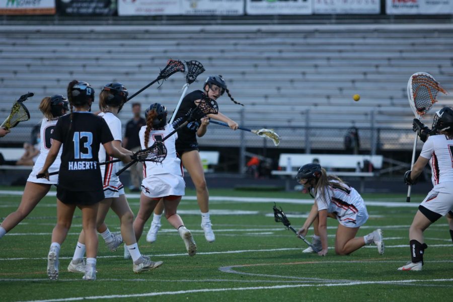 Attaacker Ellie Wilkins takes a shot on goal up the middle. She scored five goals throughout the night.