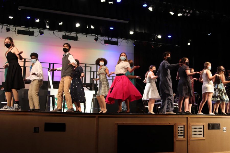 The All Shook Up cast performs the first large group number of the musical.