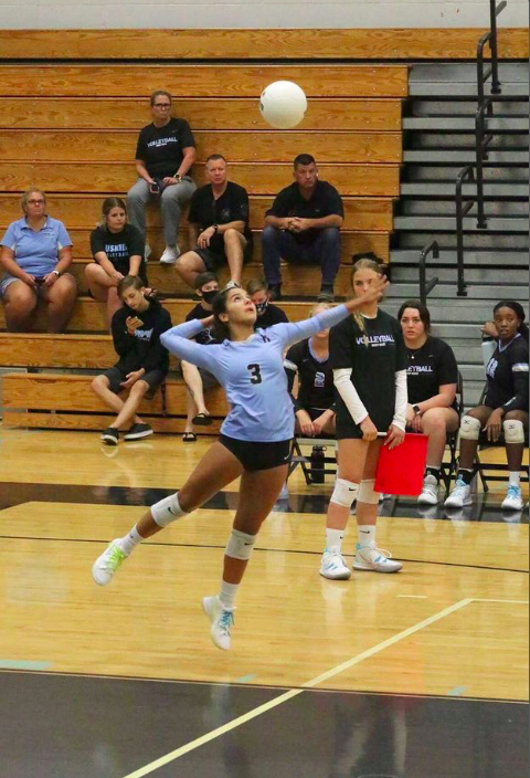 Libero Mayte Camacho is serving the ball against Winter Springs. The team  beat Winter Springs August 31, 2-3. 