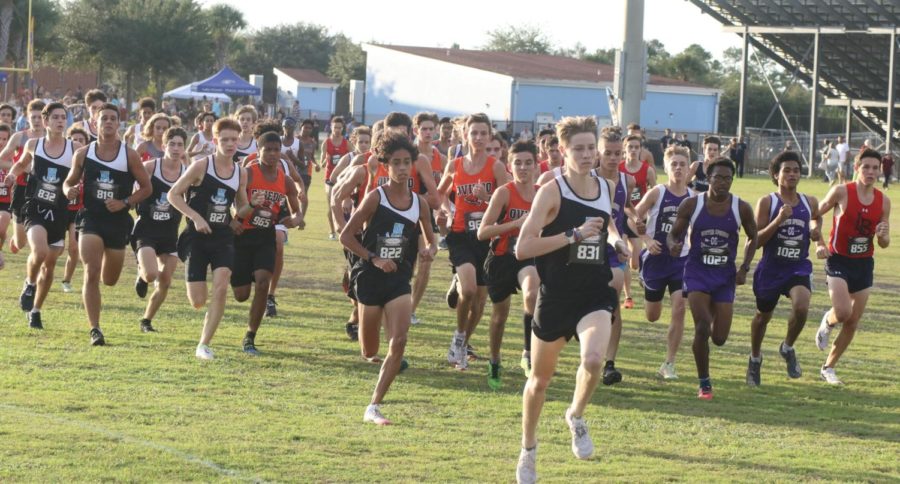 Senior+Brayden+Seymour+starts+off+the+5k+race+leading+the+pack.+The+boys+varsity+cross+country+team+won+the+Seminole+county+athletic+conference+championship.