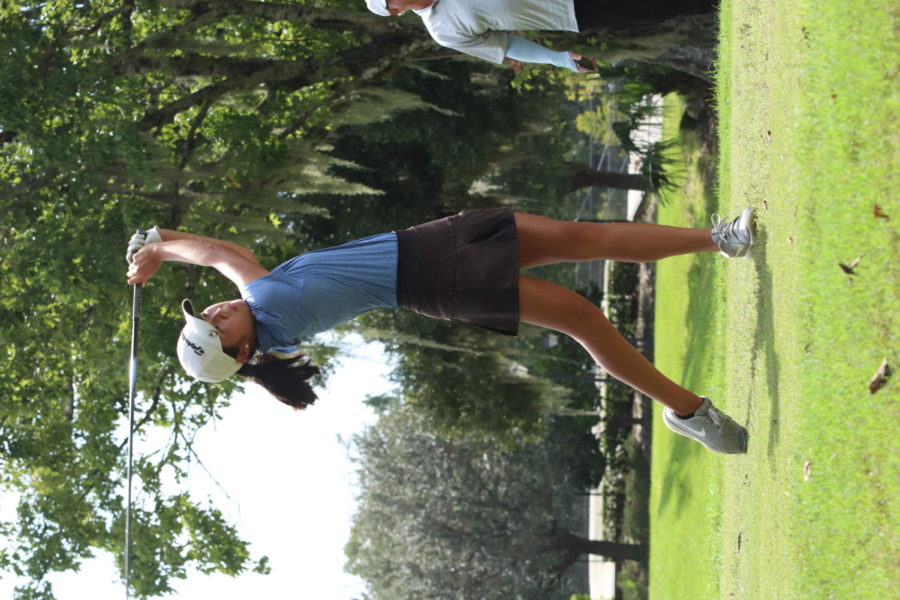 Chelsea Nguyen finishes her swing. The team lost the match against Lake Brantley.