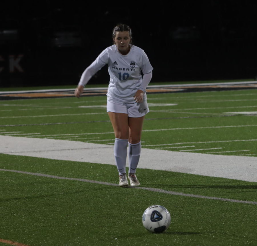Center back Riley Sophia takes a free shot from out half of the field. On Feb. 8, for the first time in six years, varsity girls soccer beat Oviedo in the regional quarterfinals, 2-1.