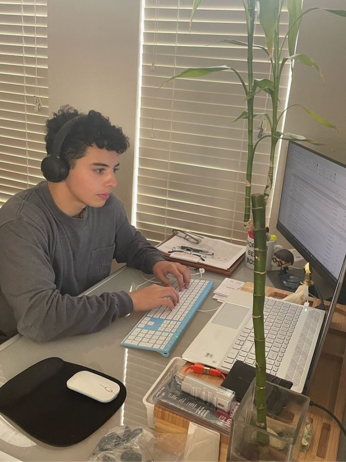 Junior Diego Osorio works as a GES Research assistant after school. With tight schedules and almost no time at all, students find ways to adapt to a filled schedule with work and school. 