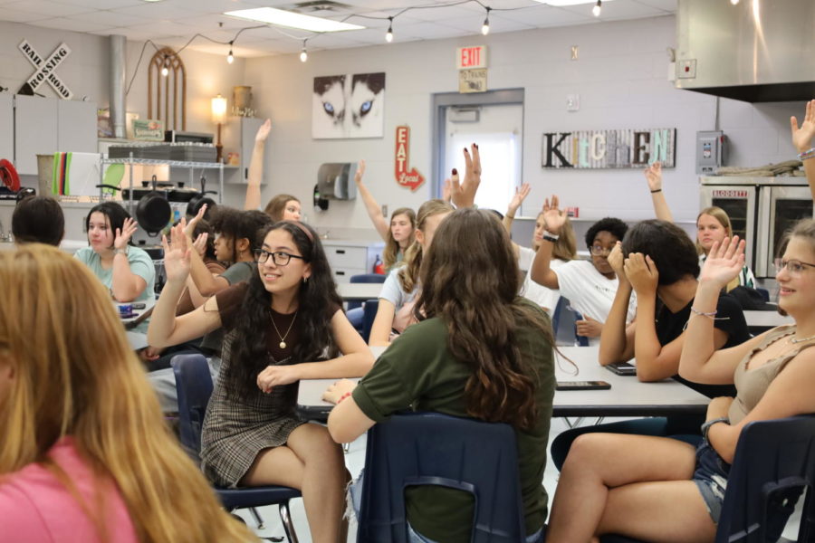 Students raise their hands to show if they had cooking or baking experience. The next meeting will be on Thursday, Sept. 15 from 2:30-4 in room 6-111.