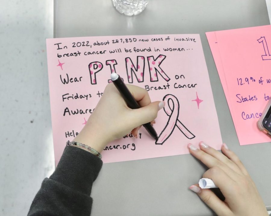 The Girl-Up Club hosted a meeting on Oct. 14 where they made posters to hang up around school for Breast Cancer Awareness Month. 
