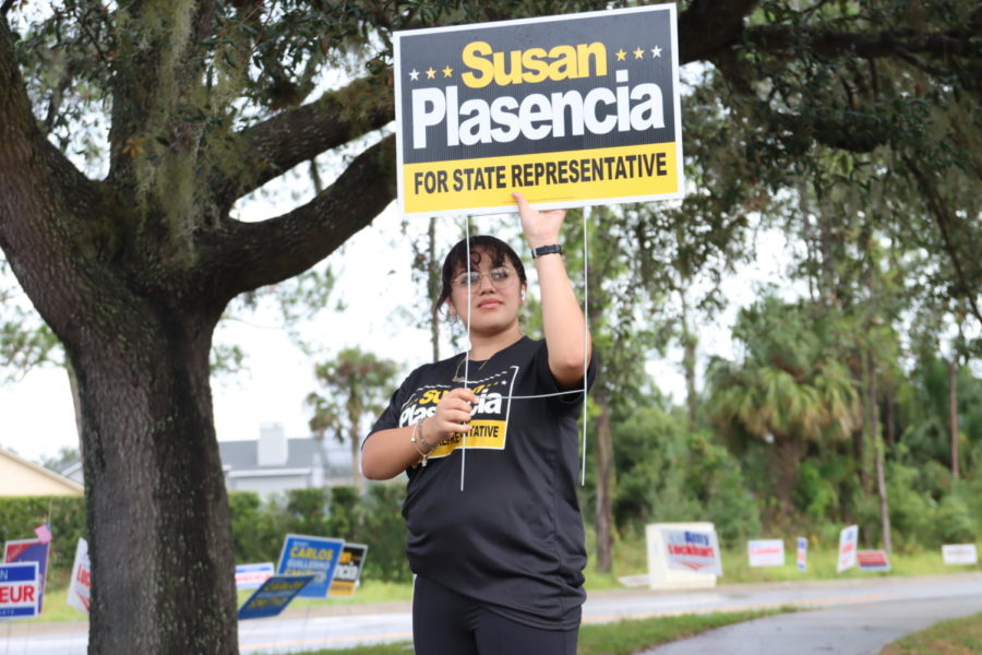 A+grassroots+worker+for+state+representative+Susan+Placensia+stands+outside+the+Oviedo+Presbyterian+Church.+The+church+served+as+a+polling+place+and+campaign+grounds+for+the+Florida+midterms.