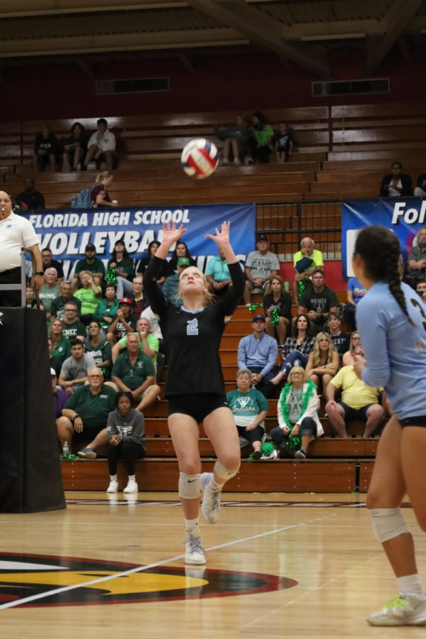 Setter Brielle Mullen assists outside hitter Brooke Stephens for the kill. The team lost the state championships against Venice 3-1.