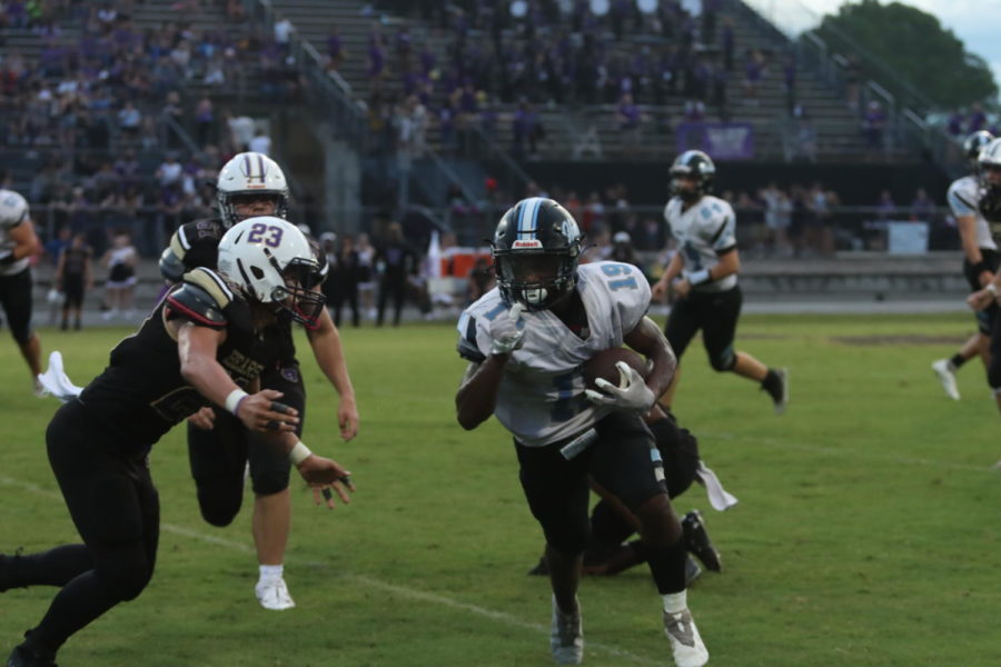 Cornerback Jalon Lewis is running the ball to the end zone. They beat Winter Springs 48-0. 