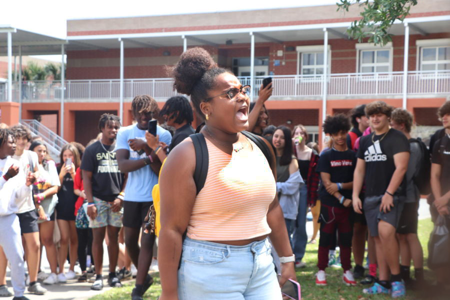 Senior Ciara Bibbs passionately addresses Hagerty students at the walkout. The walkout was peacefully protesting gun violence after a recent shooting at The Covenant School in Nashville.  
