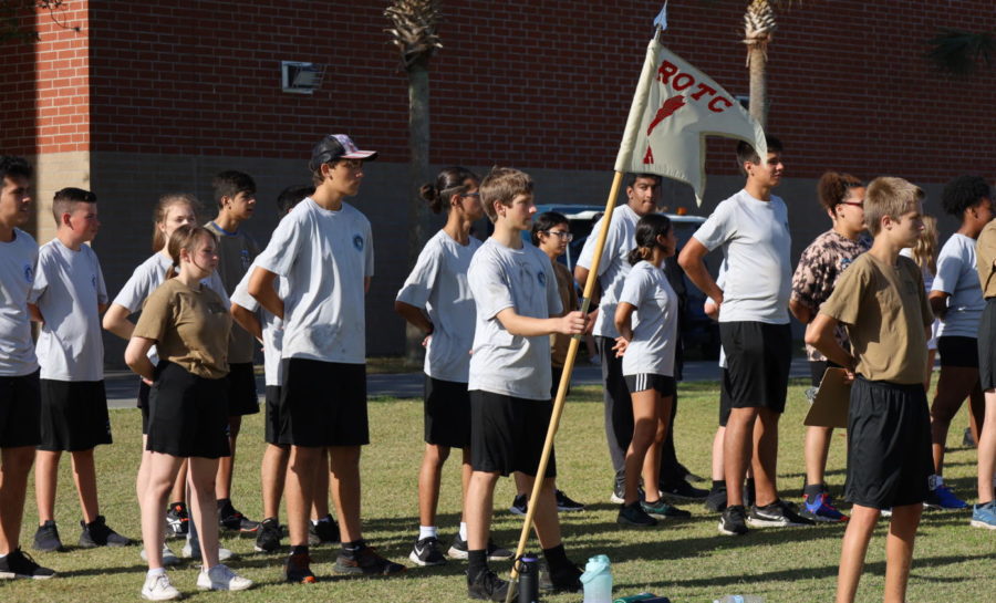 The JROTC battalion stand in formation within their companies, while preparing to play soccer. Soccer was one among the many game they placed on their March 31, field day. 