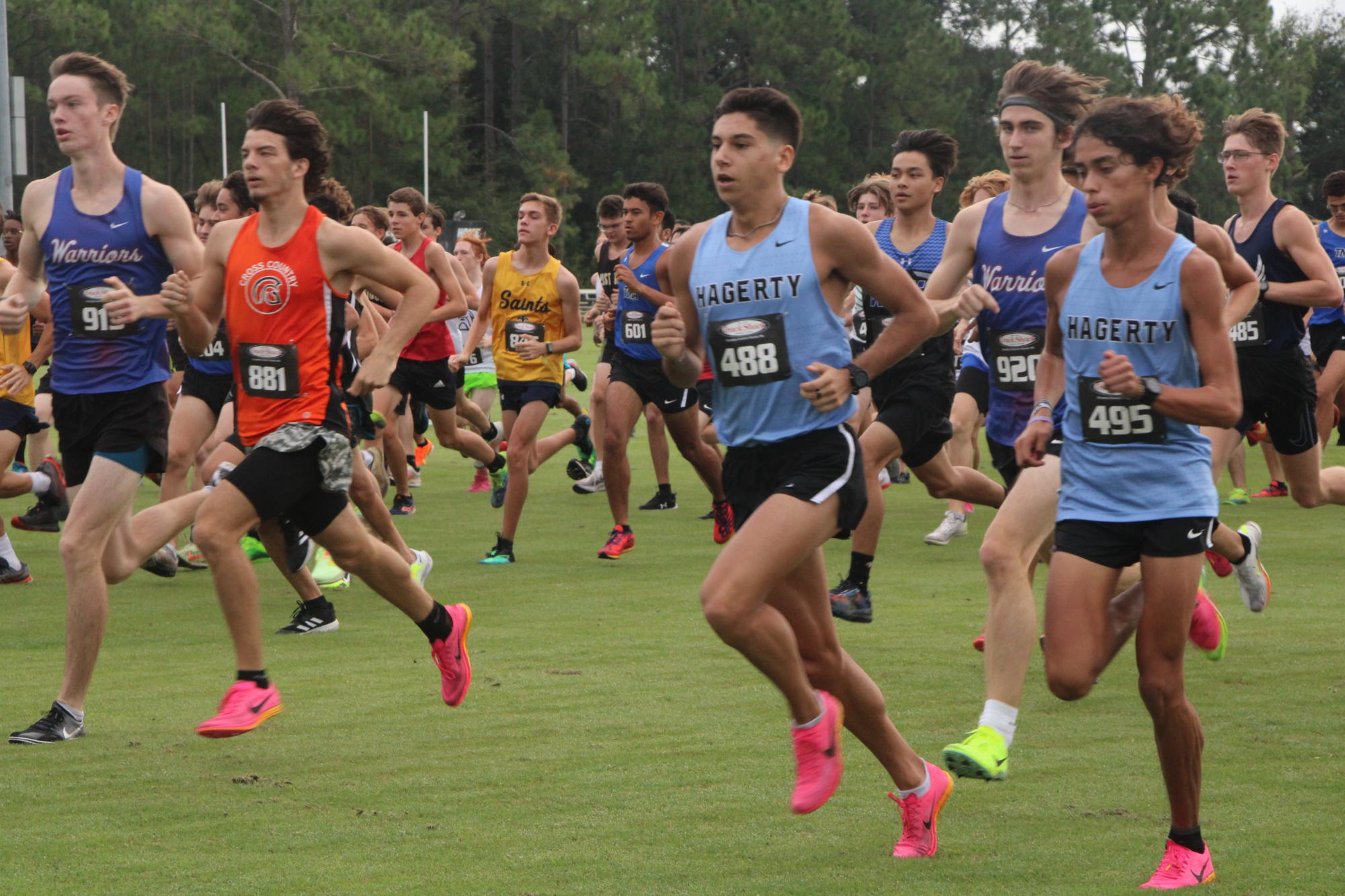 Senior runners Gabriel Abbate and Johnathan Leon start the Deland Invitational race. On Sept. 5, the boys cross-country team took first at the meet.